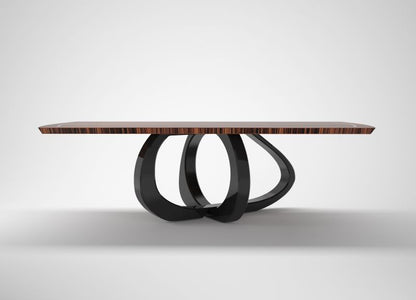 Design-Esstisch mit geschwungenem Fuß