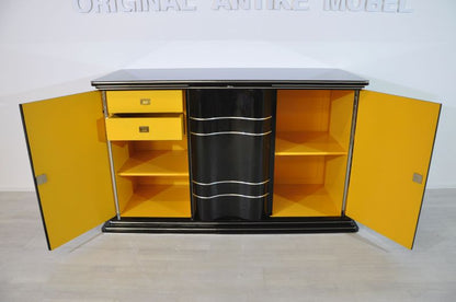 Art-déco-Sideboard mit leuchtend gelber Innenausstattung