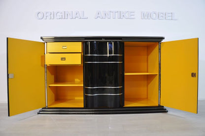 Art-déco-Sideboard mit leuchtend gelber Innenausstattung