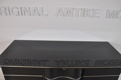 Art-déco-Sideboard mit leuchtend gelber Innenausstattung